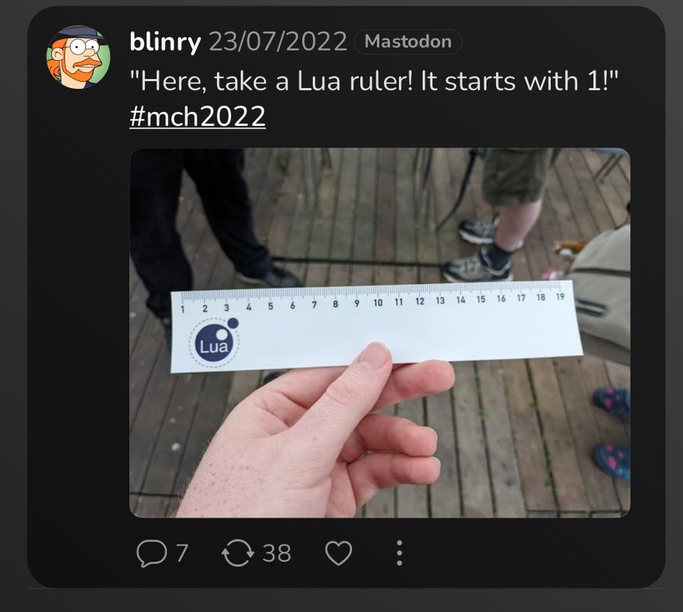 Screenshot of a Mastodon post showing a Lua ruler in someone’s hand. The post says “Here, take a Lua ruler! It starts with one!”