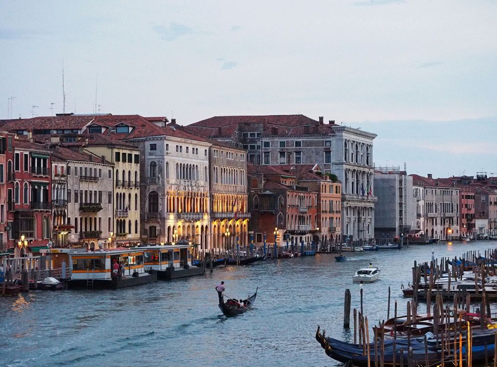 A gondola on the main canal of Venice at dusk