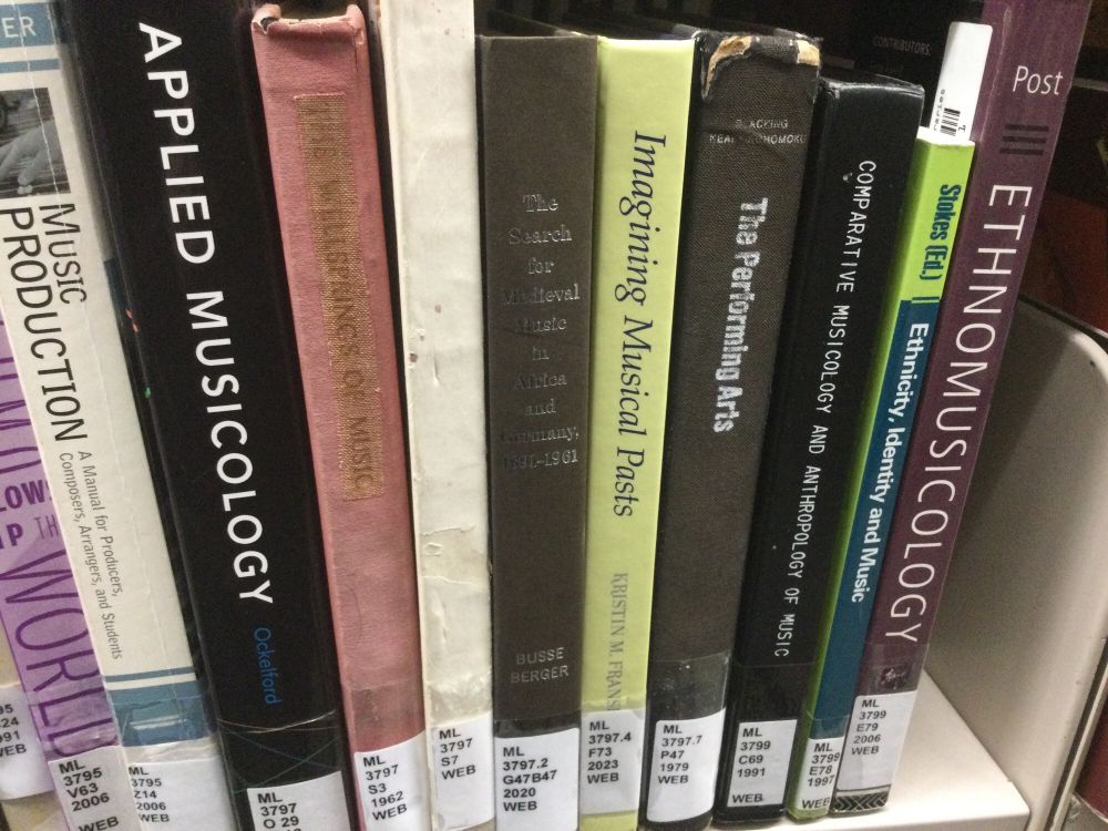A shelf of library books on musicology, including my book Imagining Musical Pasts.