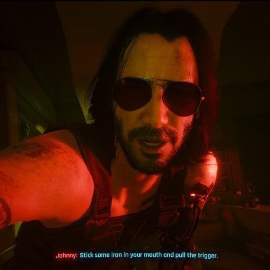 Johnny Silverhand from Cyberpunk 2077 in the iconic scene where he tells you to stick a candy in your mouth and love yourself 💜