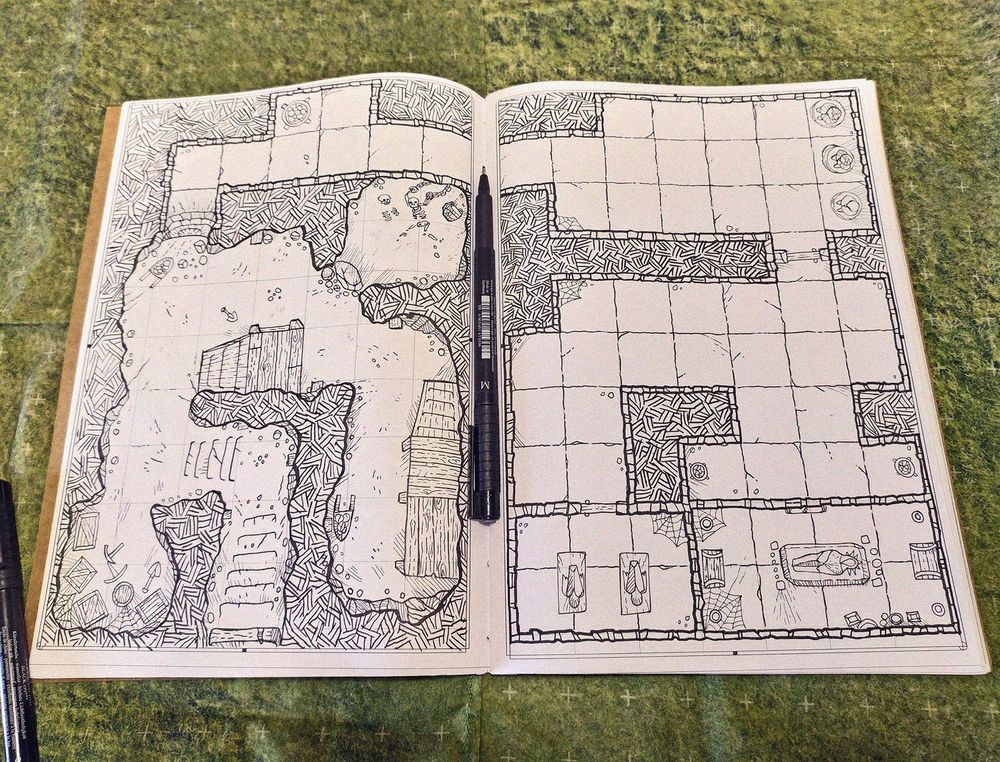 sketchbook page photo with the black and white drawing of a dungeon, whose entrance is through an abandoned mine leading to a script with some sarcophagi and a secret tomb.