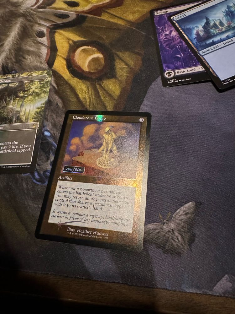 Photo of a serialized Magic: The Gathering card. Cloudstone Curio 288/500