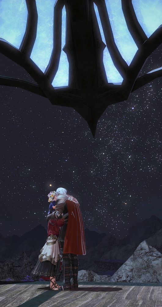Made by user necromeowncy.bsky.social
Shot from the video game featuring The Crystal Exarch, Haurchefant Greystone, and my Warrior of Light, Arion Artemicion.

Arion sits on the Exarch's shoulders so that he can better reach Haurchefant (to give him a kiss on the forehead). Haurchefant still has to bend down somewhat. The Exarch is hugging Haurchefant around the middle. We see this from the back.

They stand on the observation tower in the Crystarium, looking out at Lakeland under a starry sky.