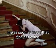 A woman lying on the stairs face down w the words “me as soon as i hear that fine ass voice”