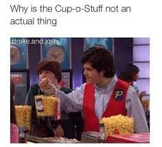 A scene from the Nickelodeon sitcom "Drake and Josh" where Josh is holding a the "cup-o-stuff" designed by his sister. The "cup-o-stuff" is a clear plastic bucket with a handle. It has three four compartments: a bottom compartment for a large drink (with a straw that sticks out), a top compartment for a large popcorn, and two side pockets for candy. 

The text above the image says "Why is the cup-o-stuff not an actual thing." 