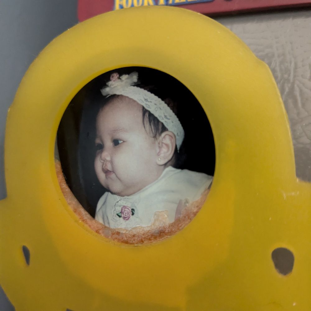 Casey's baby photo. She was maybe one in this photo, and she had the roundest, chubbiest cheeks. 