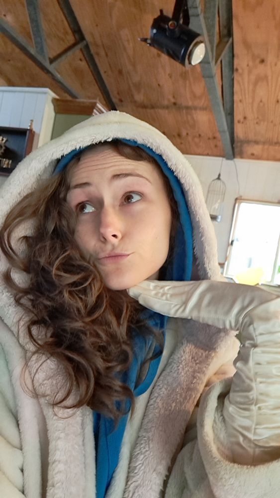 Much like the first image but this time she's doing a little pout