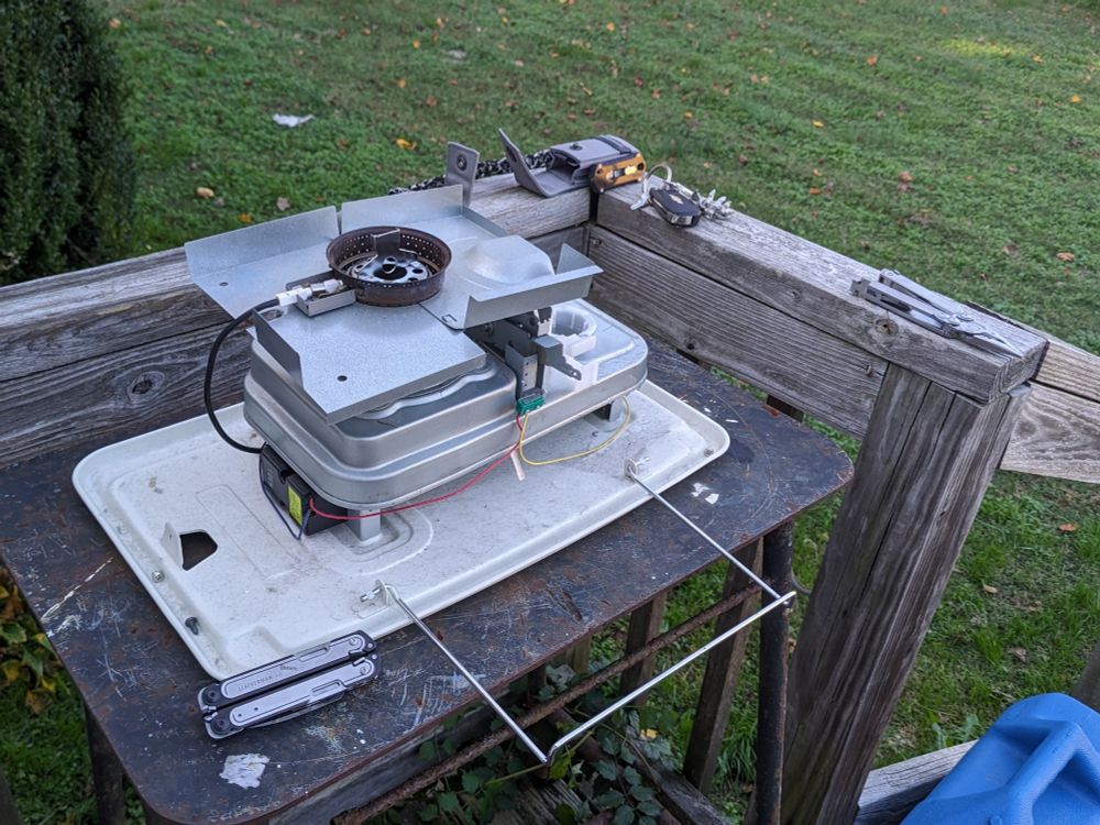 A deconstructed heater getting a wick replacement.