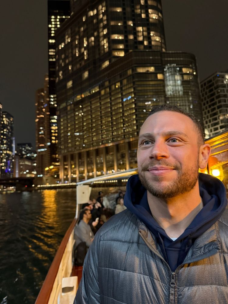 man in jacket on a boat in Chicago 
