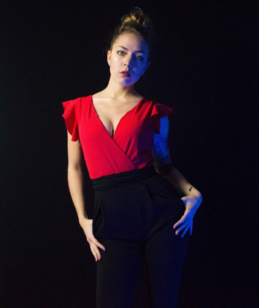 I look very strict with my red and black suit, but don't worry, I'll take care of you