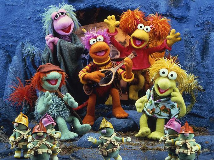 The Fraggles and their little green worker friends (employees? comrades?) in Fraggle Rock