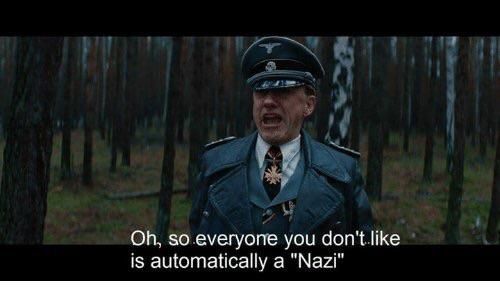 Screenshot from Inglorious Basterds of Hans Landa, Nazi SS officer, shouting as he's about to meet his fate at the film's end, captioned with "Oh, so everyone you don't like is automatically a 'Nazi'"