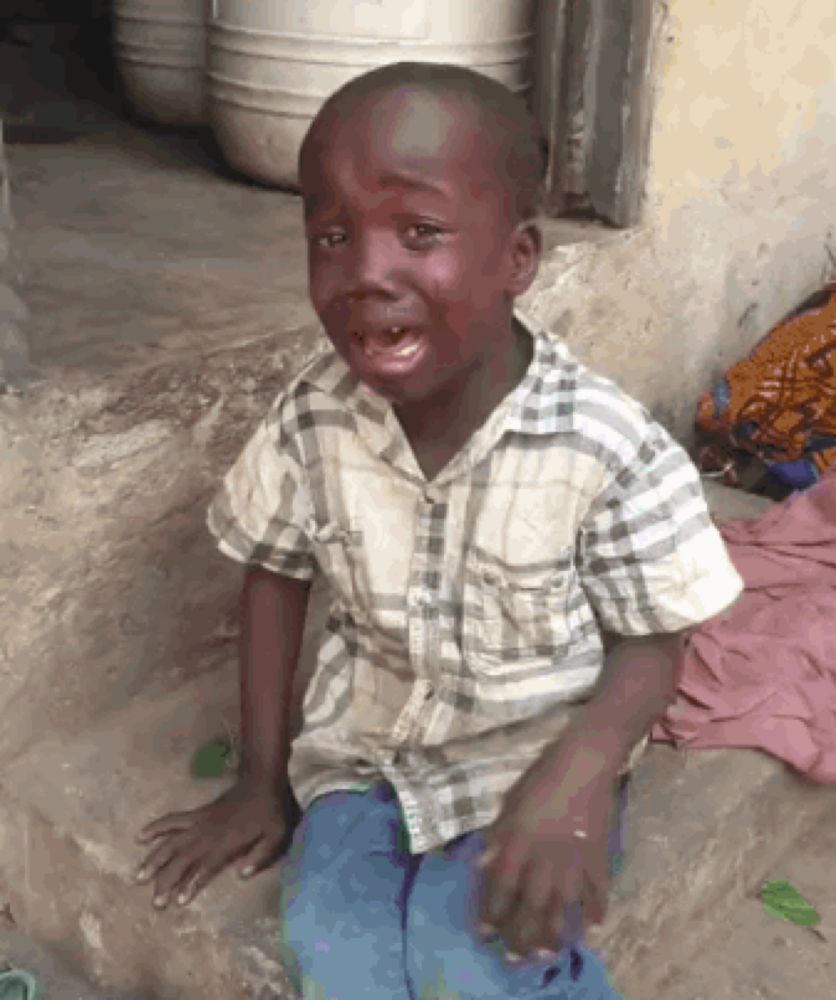 African Boy Crying Then Laughing GIF