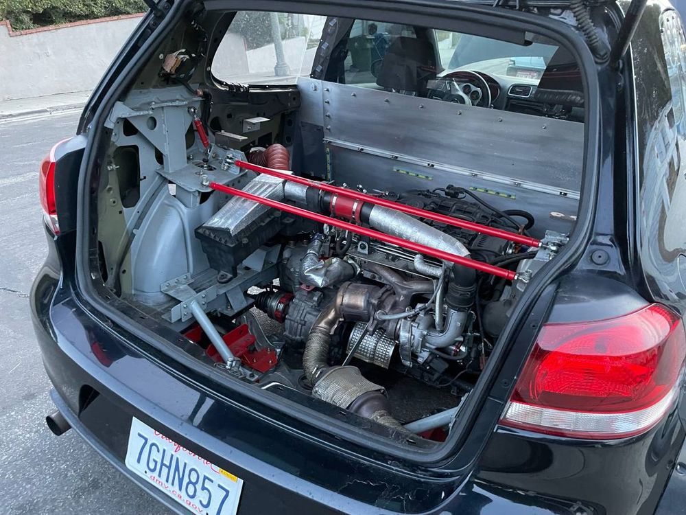 A black mid-engined (!) Mk6 VW GTI
