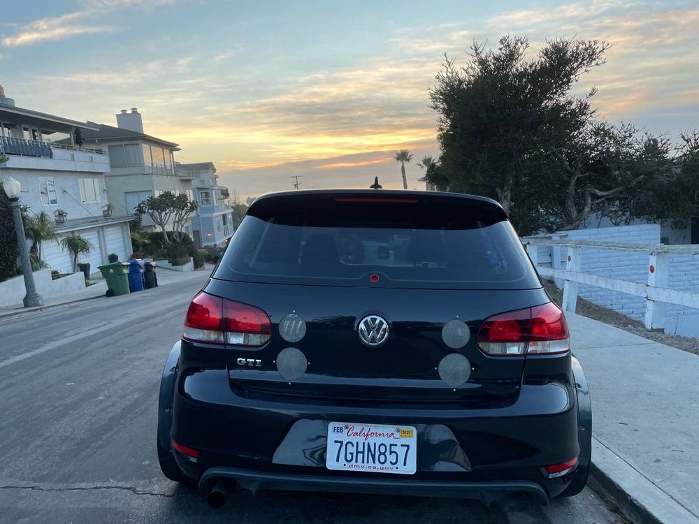 A black mid-engined (!) Mk6 VW GTI