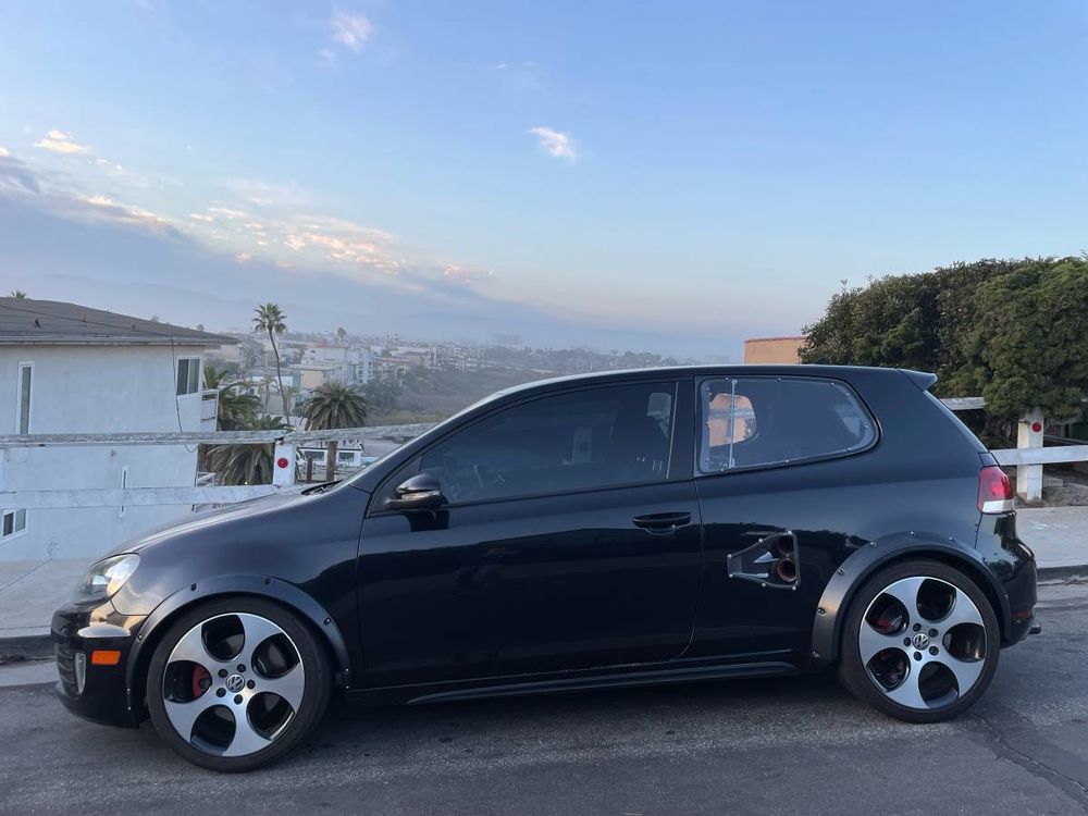 A black mid-engined (!) Mk6 VW GTI