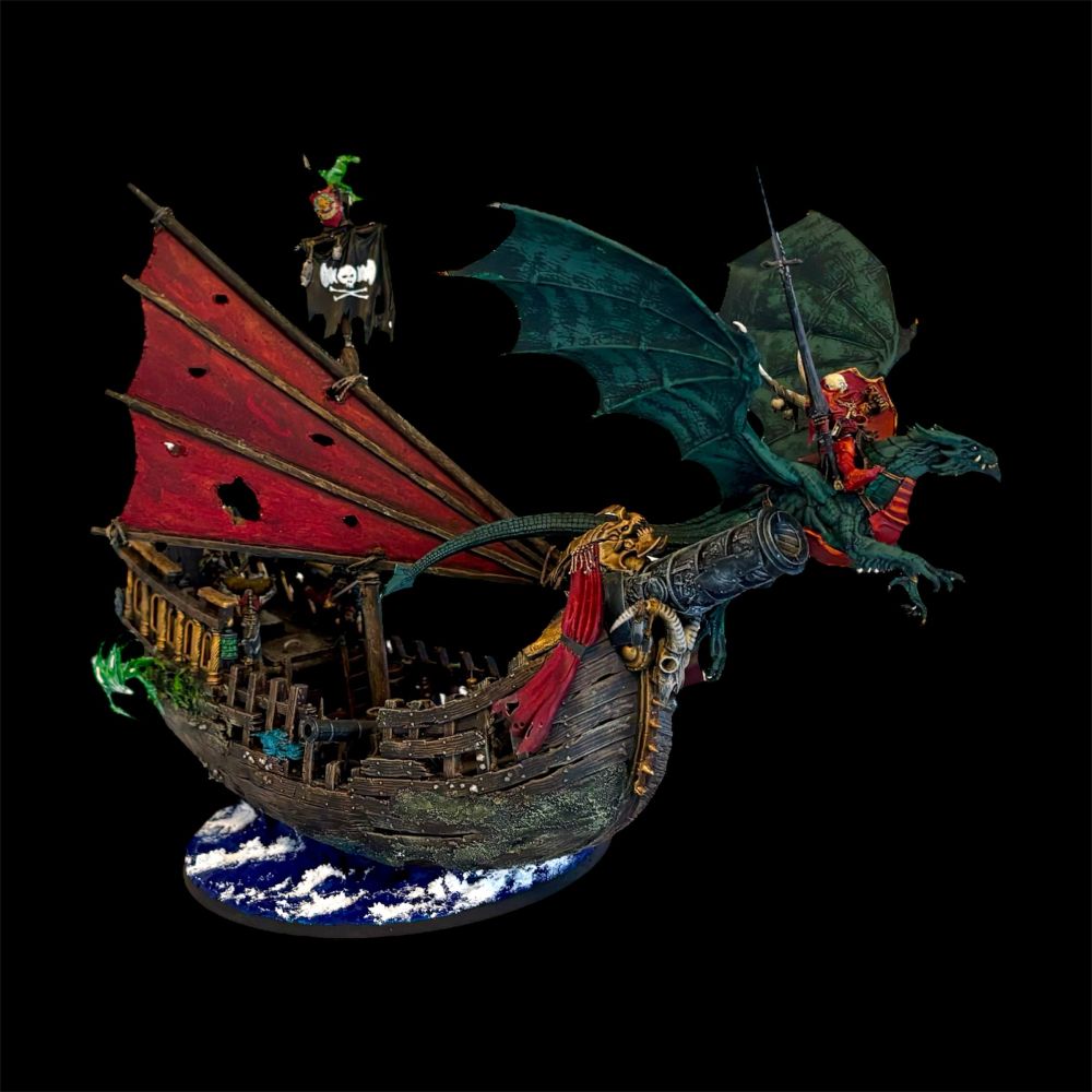 A ghost pirate ship sails the seas with a vampire riding a dragon beside it.