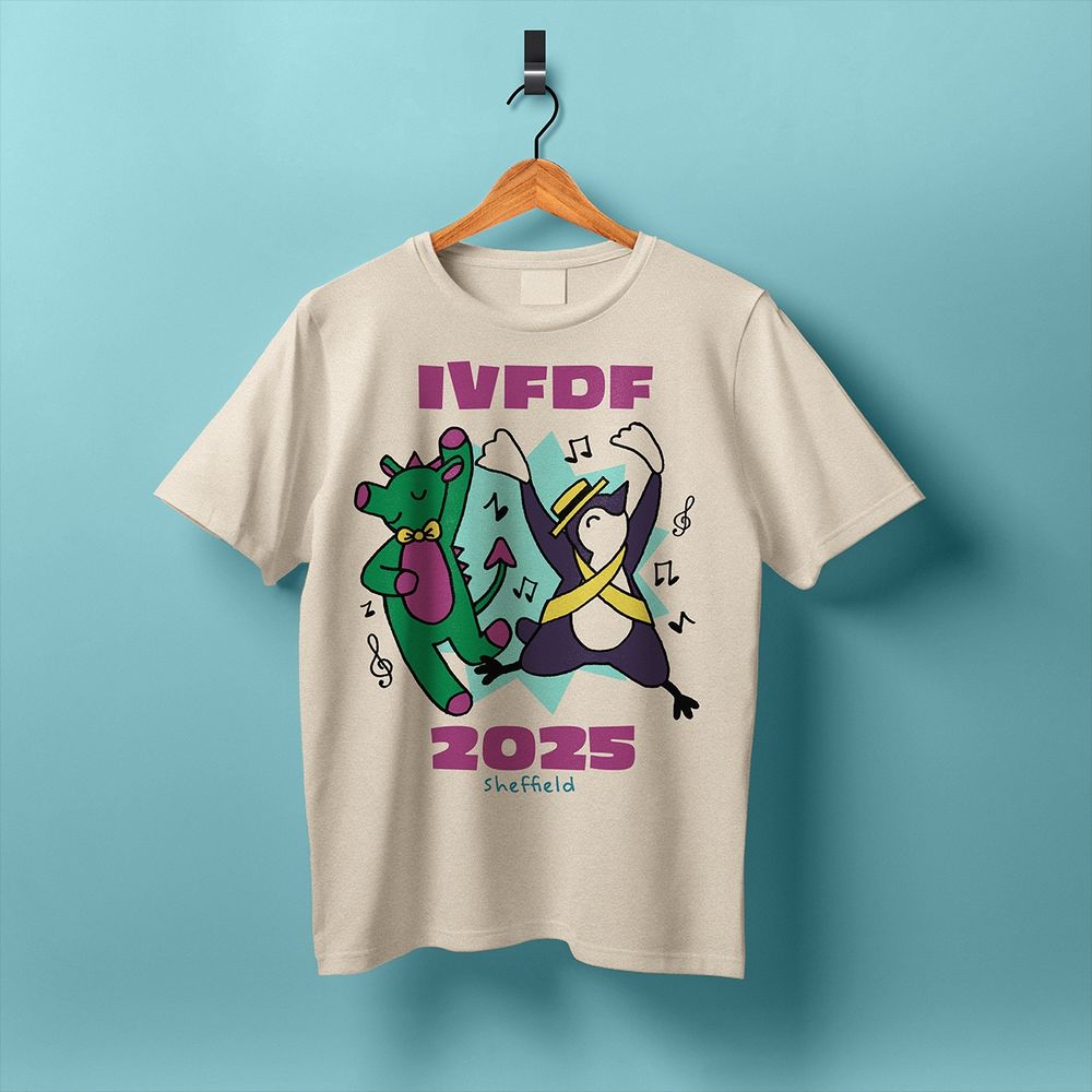 The flatlay design described in the last post has been mocked up on an off-white t-shirt hanging by a brown hanger on a black metal hook.  The t-shirt hangs on a cyan background that matches the star on the t-shirt.