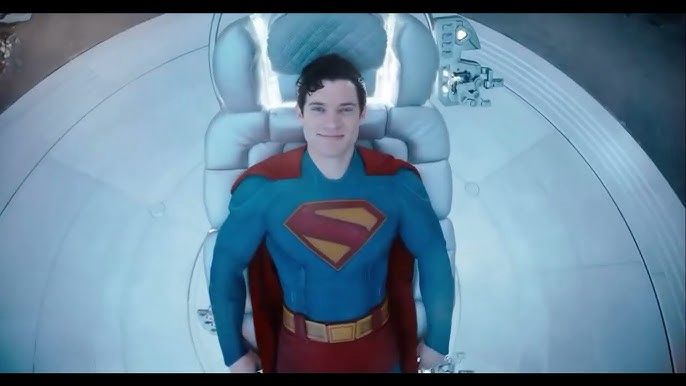Superman smiling watching memories of his parents