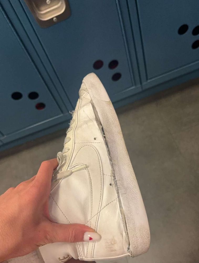 Beat up white shoe