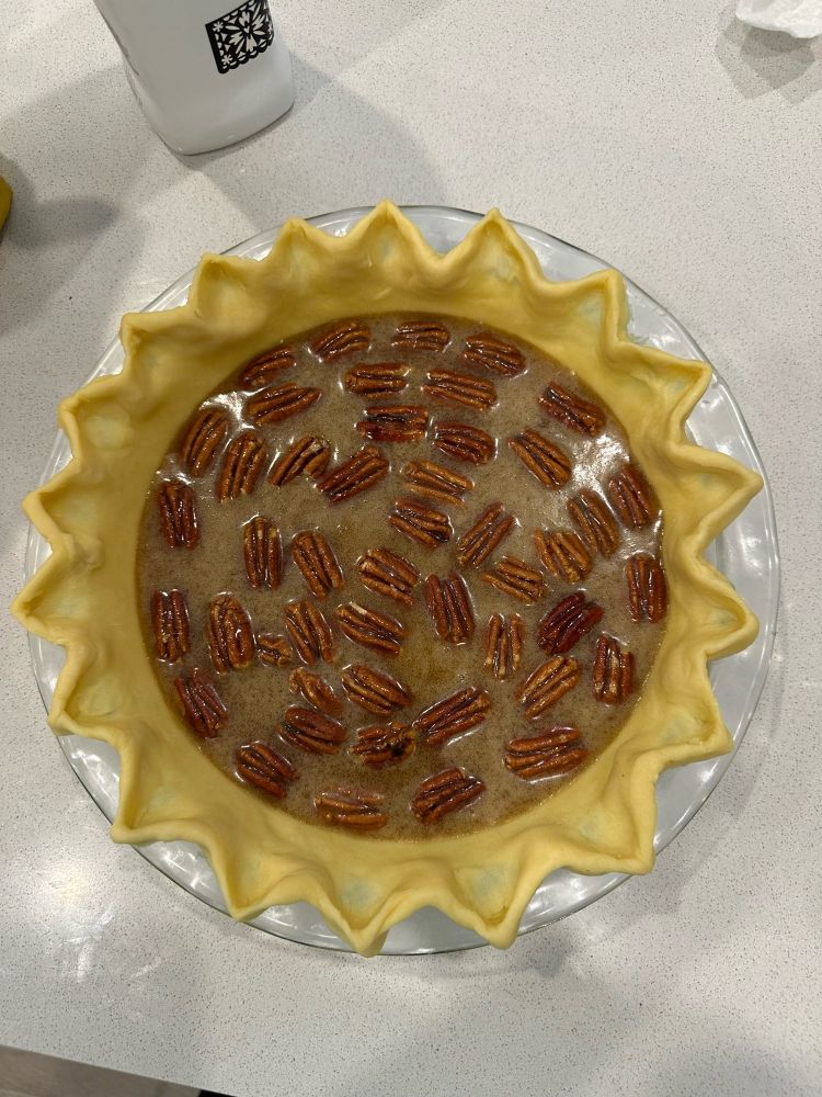 Pecan honey pie ready to bake.