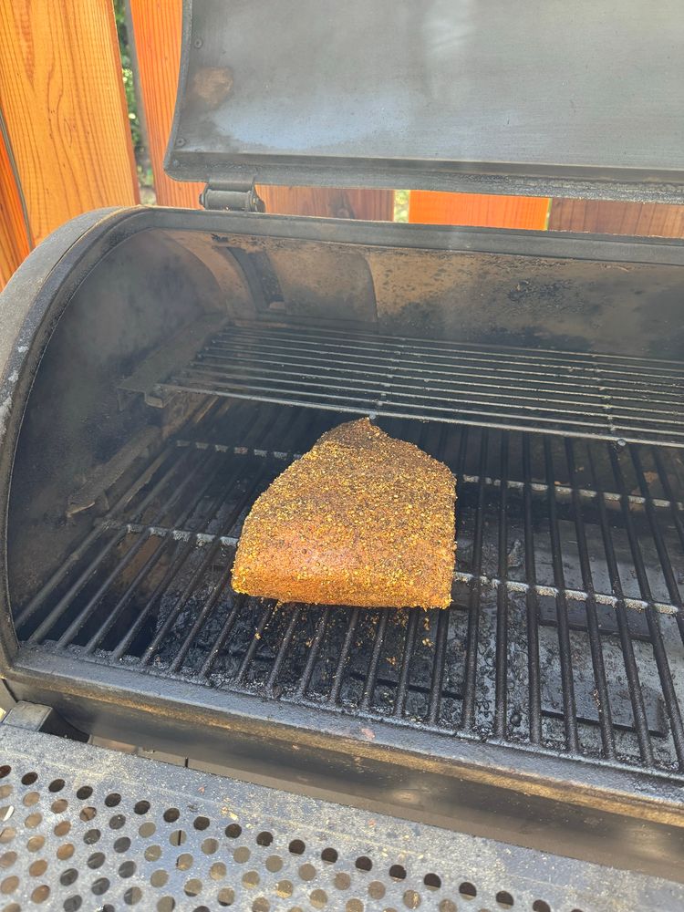 Brisket sitting on my smoker about to be turned into pastrami.