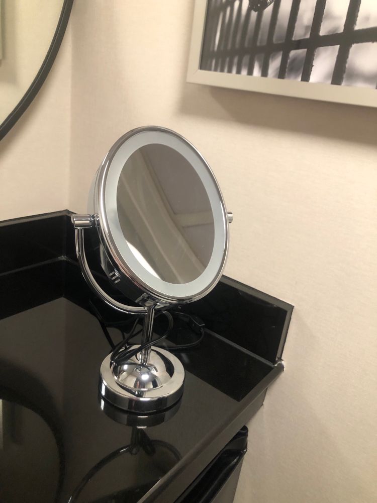Photo of a magnifying mirror. 