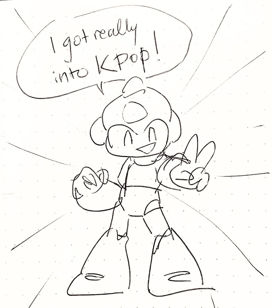 A simple doodle of MegaMan striking a pose, his hand extended out with a peace sign and giving a cheery smile. MegaMan says, "I got really into k-pop!" A starburst radiates out behind him, as if this is triumphant news.