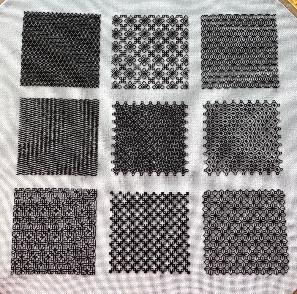 9 square blackwork sampler: waffle; open lace; leaves; harlequin; rounded eyelet; octagon star; diamond eyelet; diagonal trellis; floral lace.