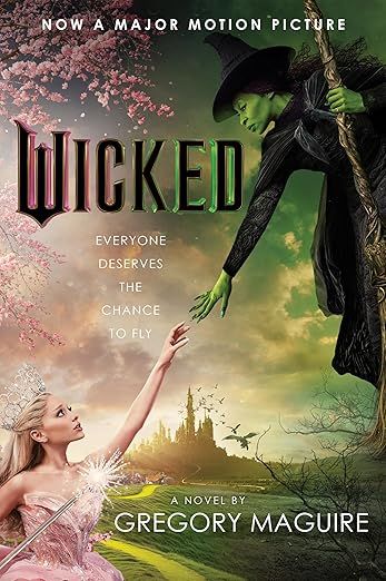 The book cover to Wicked, featuring the movie version of the characters and headlined "now a major motion picture"
