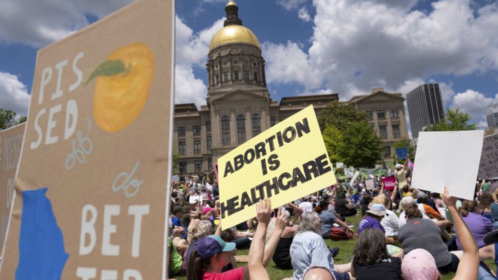 Georgia Supreme Court restores near-ban on abortions while state appeals