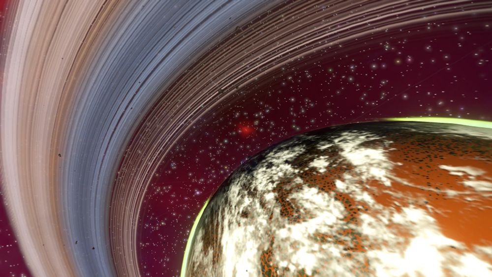 An orange/brown plant speckled with cloud formations, we look at it from orbit with a ring of asteroids framing the image. The darkness of space has a burgundy tinge to it again at the pinpricks of light of distant stars.