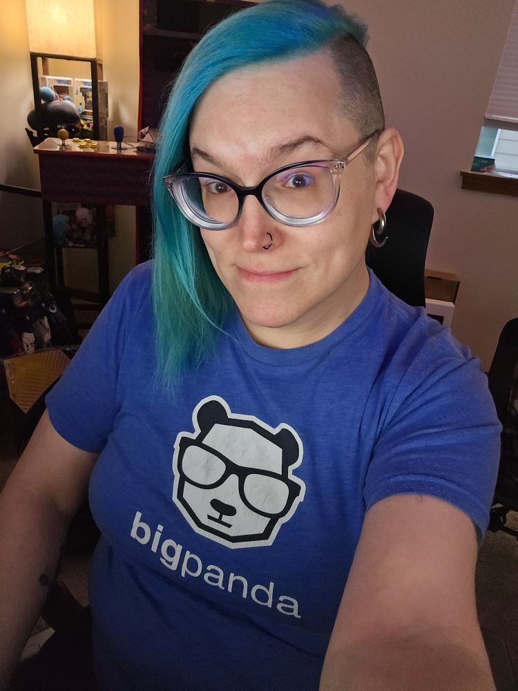 blue-haired girl dressed in some lazy old con swag