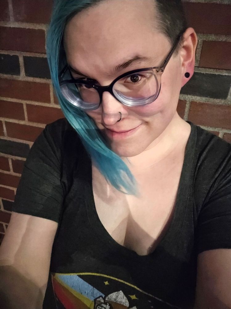 blue-haired girl. still awkward, but less so