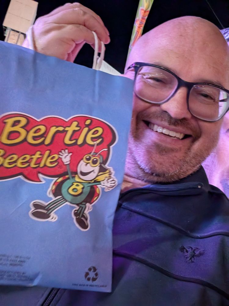 Paul with a Bertie Beetle show bag 