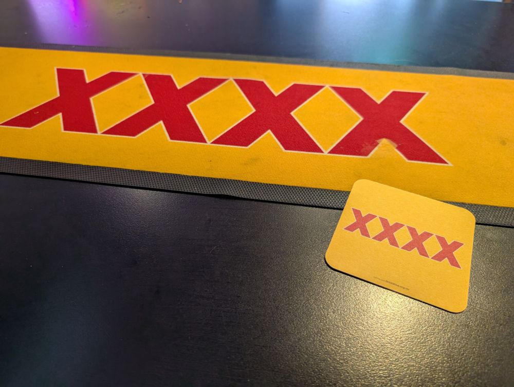 XXXX beermat and XXXX coaster 