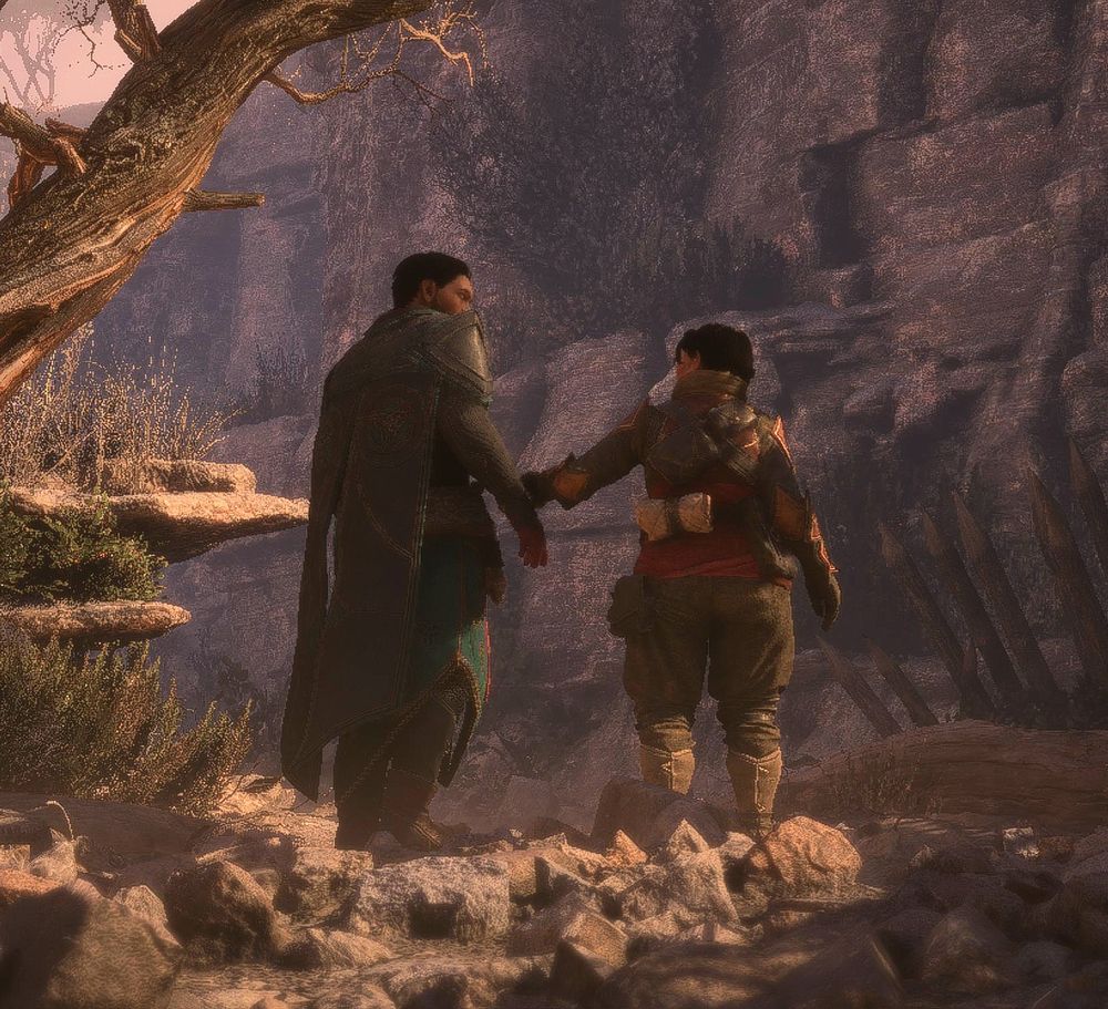 Feodore and Harding stand under a tree and she's gendly holding him back by his arm.