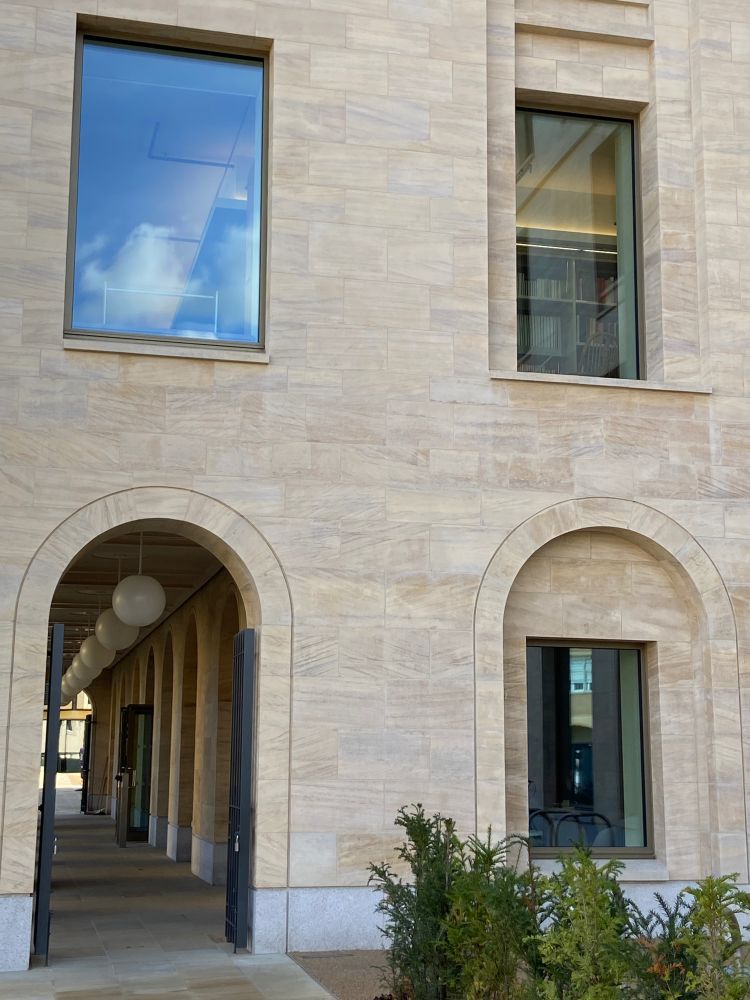 A partial exterior view of the Centre for the Humanities, University of Oxford.