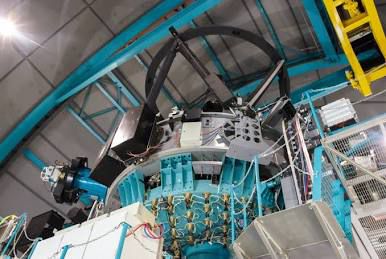 the inside of the SOAR telescope has many accents with the same teal!