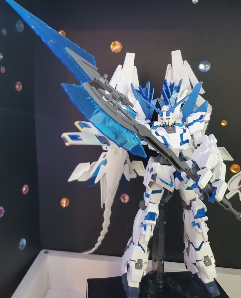 A High Grade (HG) 1/144th scale model of the giant mech suit Unicorn Gundam Perfectability 