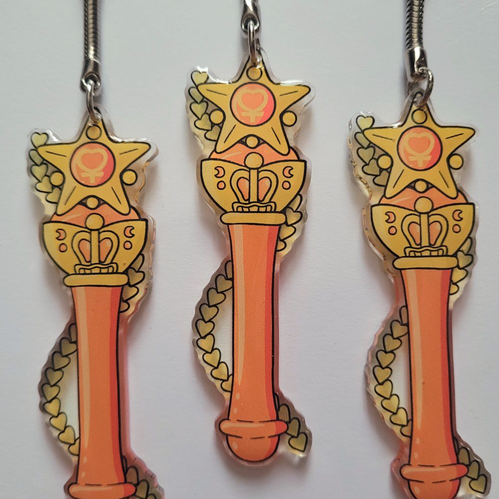 Photo of Sailor Venus Transformation Wand keychains on a white background.