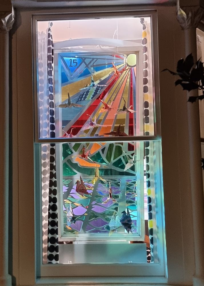 illuminated house window with a number fifteen.