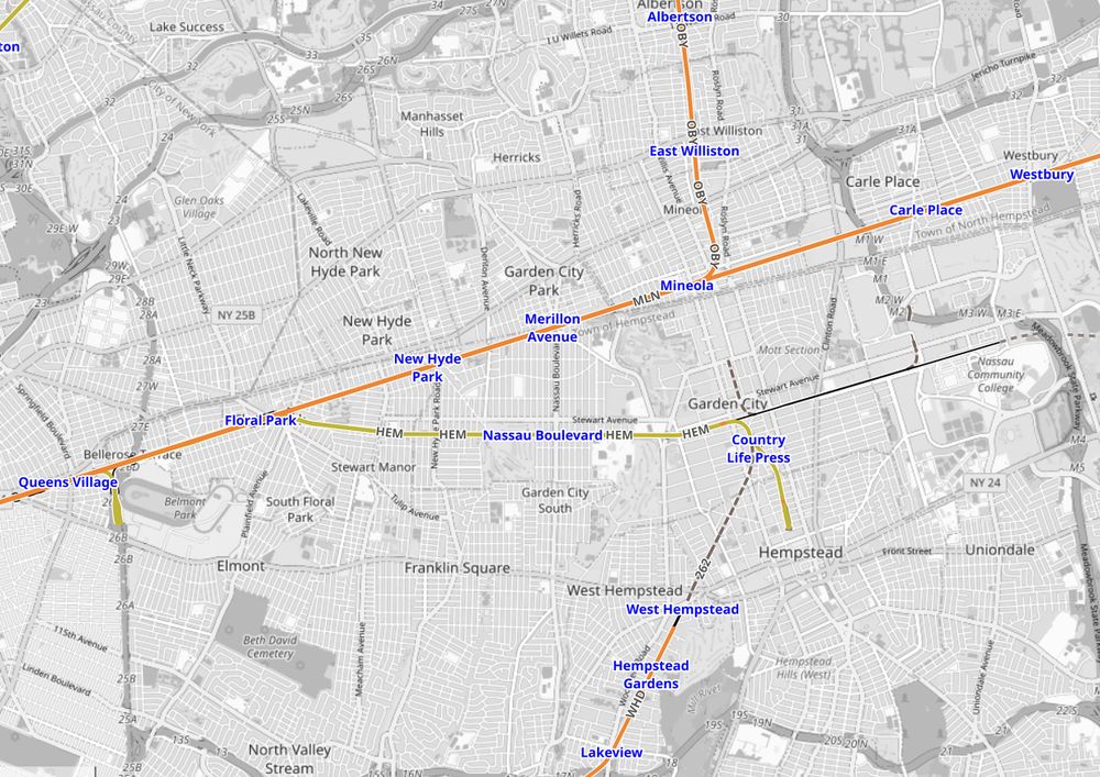 OpenRailwayMap screengrab depicting the LIRR Main Line from Queens Village to Westbury; the Hempstead Branch branches to its south to serve Garden City and Hempstead. The East Garden City branch is in black, between Garden City and what is labeled on the map as Nassau Community College.