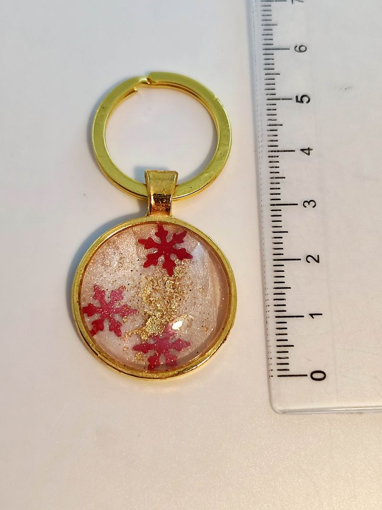 Goldener Schlüsselanhänger mit Sternen 