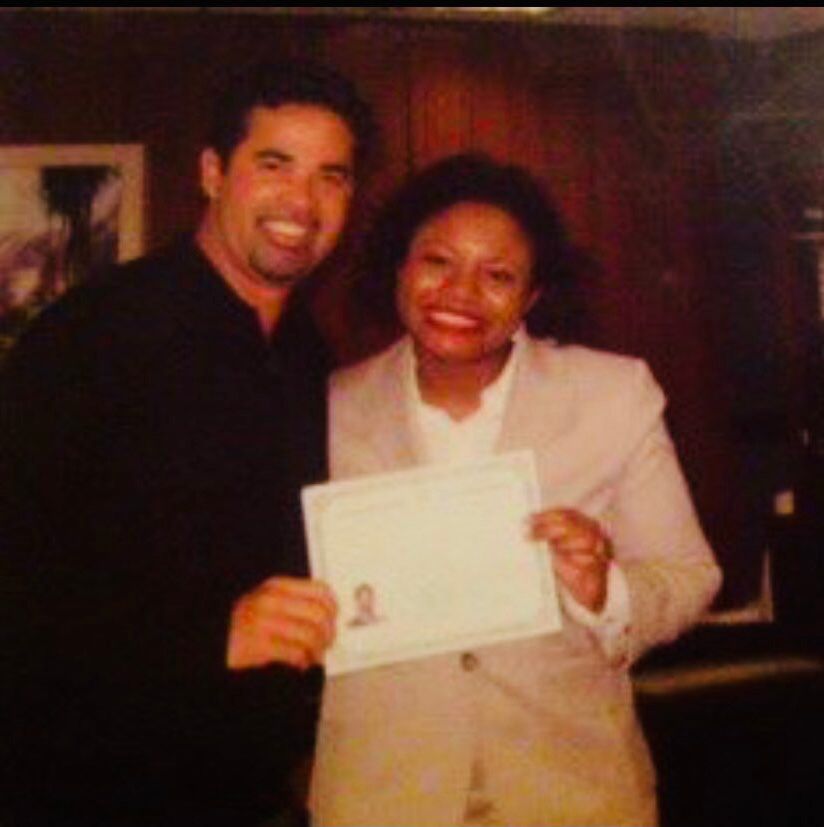 Ozzie Guillen and me holding his naturalization certificate 