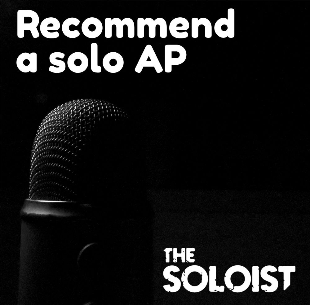 Image of a microphone with text on the top that reads "Recommend a solo AP" and on the bottom that reads "THE SOLOIST"