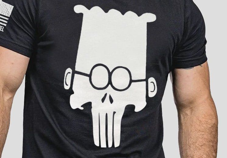 A Dilbert Punisher Skull T-shirt that makes you doubt the existence of God.