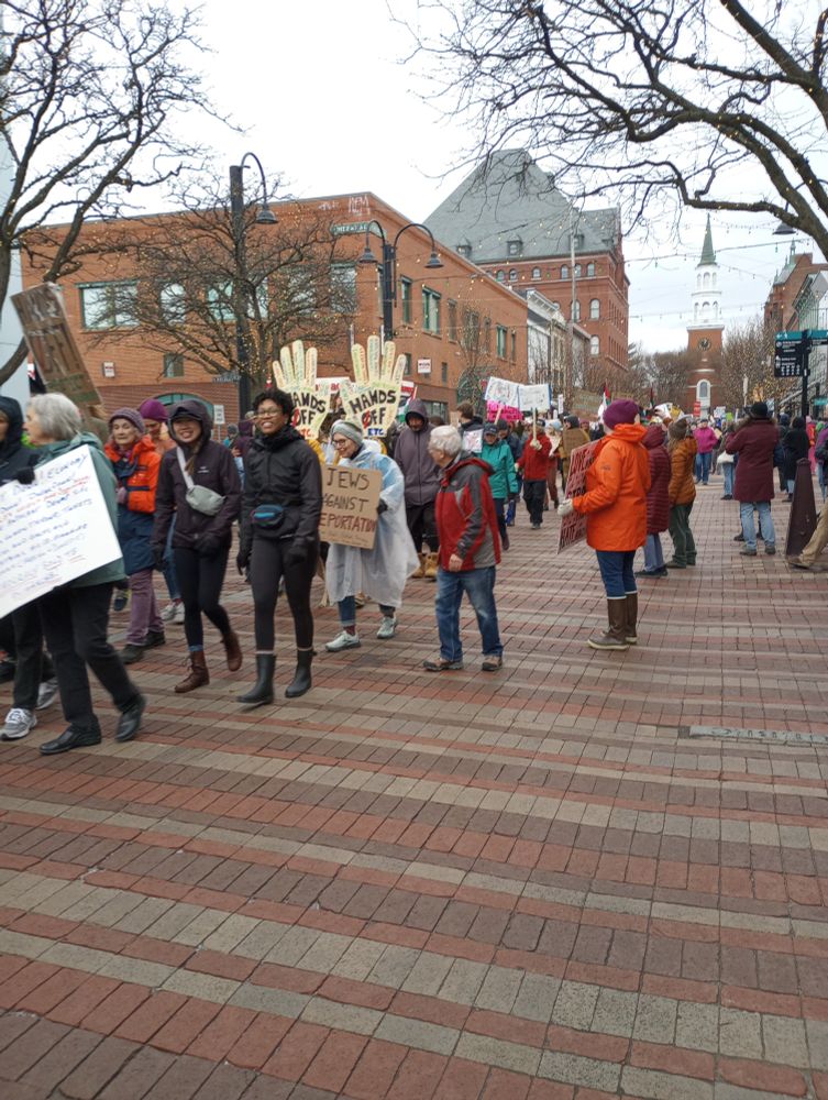 Hands-off marchers with signs in Burlington, Vermont
