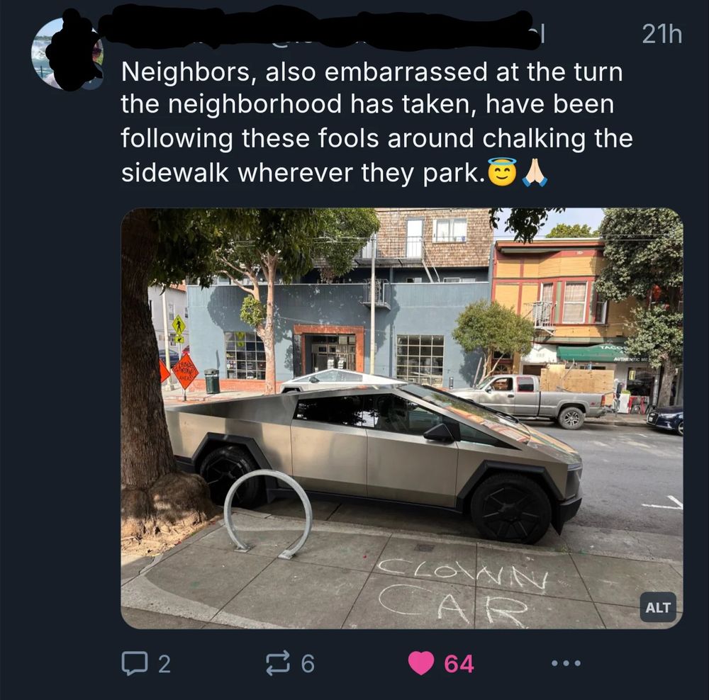 Person wrote "clown car" in chalk on sidewalk next to a CyberTruck.