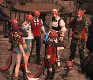 a group of g'raha tias stand next to asteria